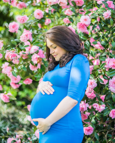 Baby bump surrounded by roses in Carlisle