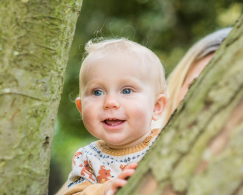 Peeping through tree - Cockermouth baby photographers