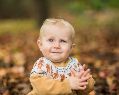 Clapping baby Pearl - outdoor family portraits Cumbria