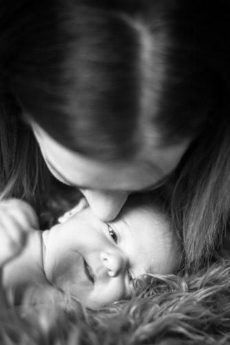 Mum kissing Nova, baby photographers Whitehaven