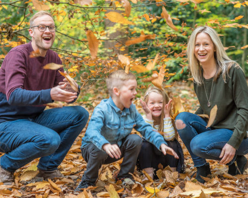 Leaf throwing family photographs Cumbria