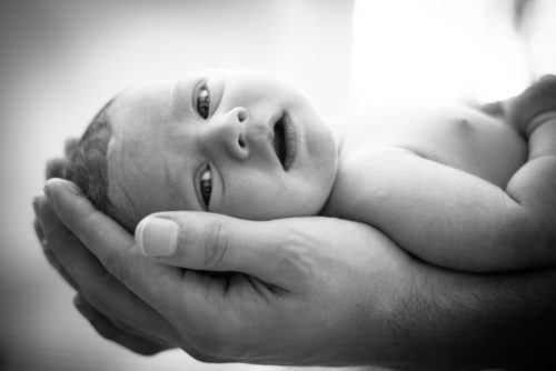 Ramsey in Dad's hands, newborn portraits Workington