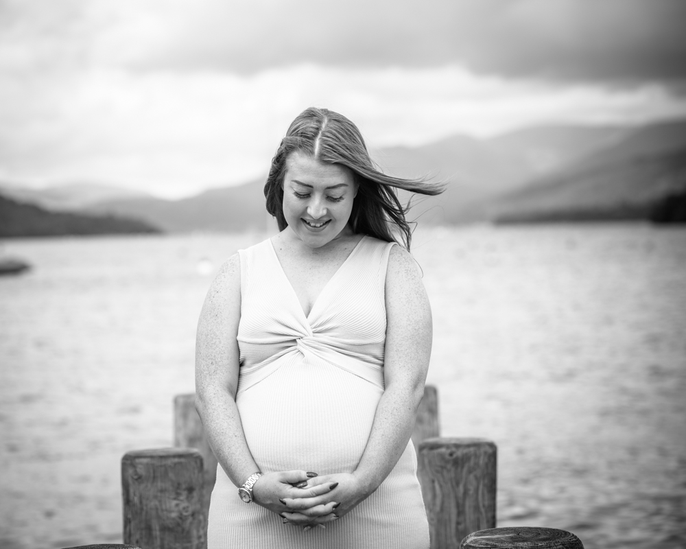 Holding onto baby bump, lake district baby photographers
