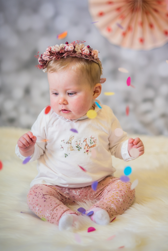 Baby covered in confetti, baby portraits Cockermouth