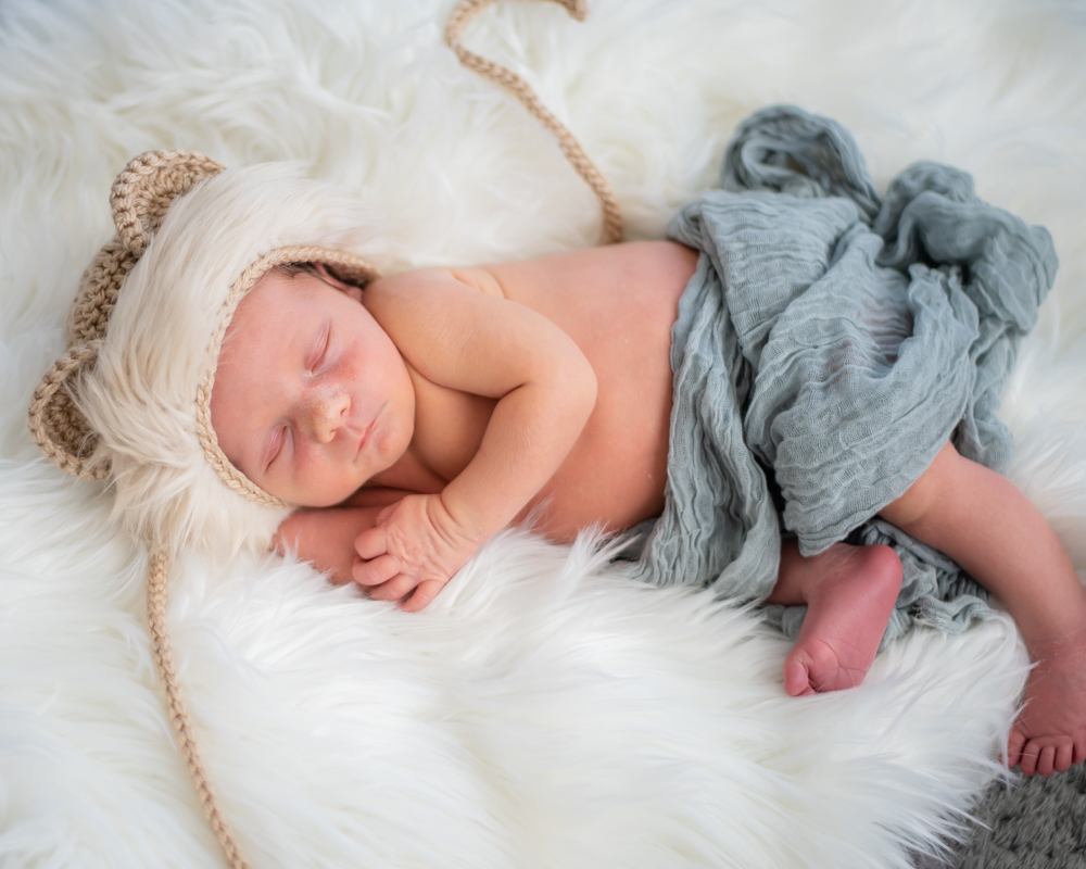 Baby sleeping on blanket, newborn photographers Wigton