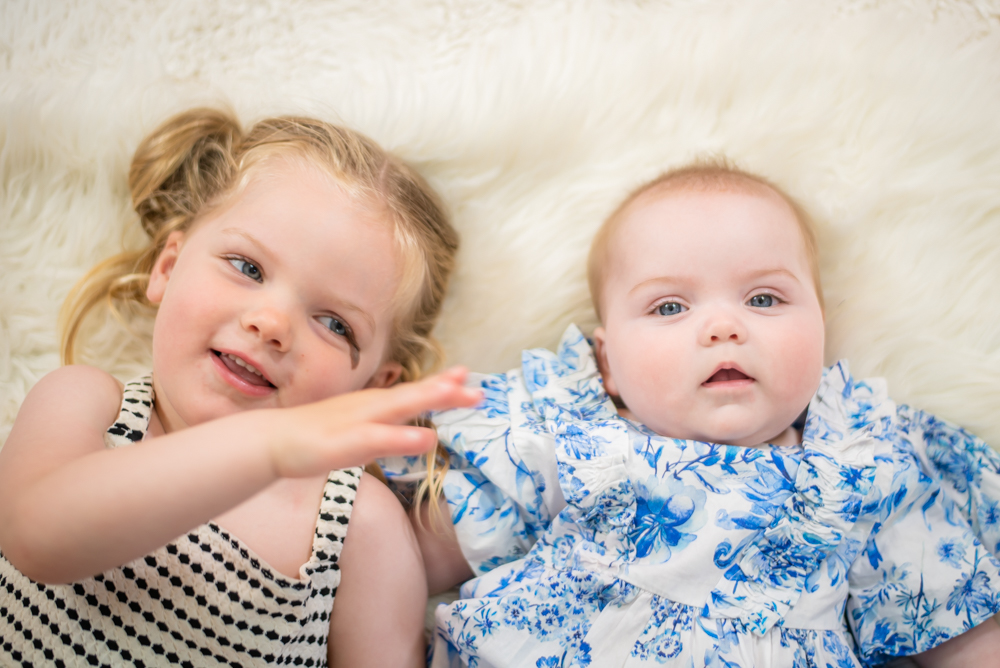 Poppy and Nell cuddles, Wigton baby photographers