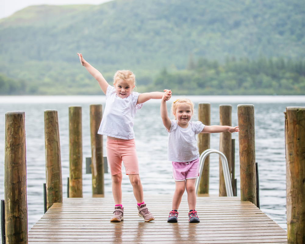 WIllow and Eva posing on a jetty, Lingholm Estate, Keswick, Lake District photographers