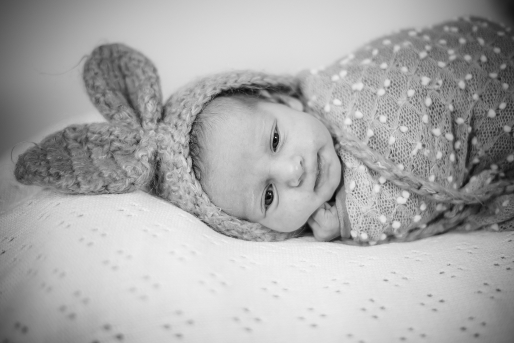 Baby in rabbit hat in blanket, newborn photographers Wigton